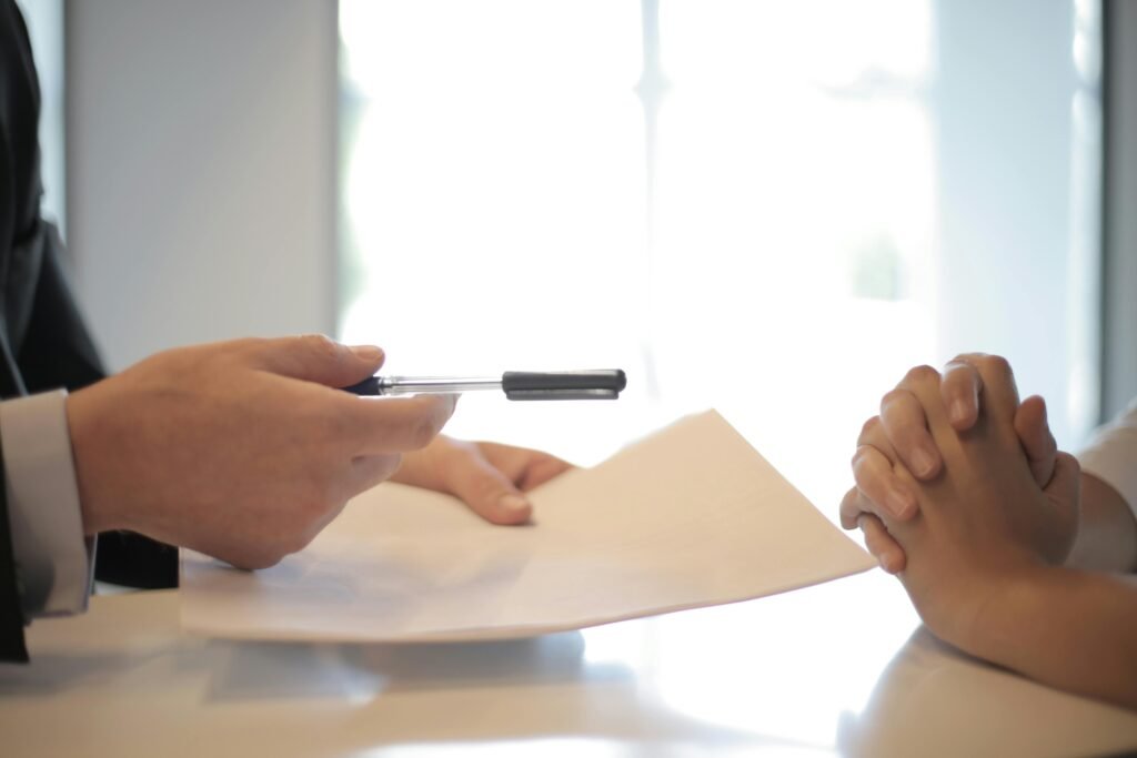 A person inspecting a document with a magnifying glass, focusing on the text '**affiliate disclosure**' and 'Trust' to illustrate legal compliance for bloggers.