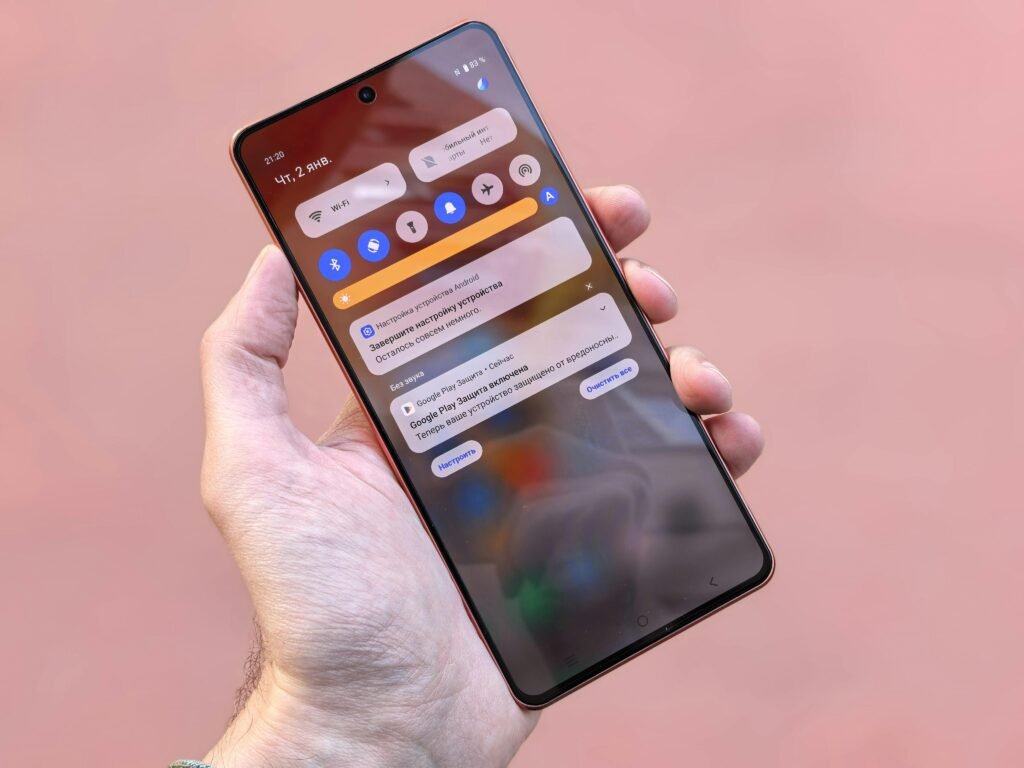 Mobile phone showing a sales notification alert for Profitable Canva Templates to Sell while the user is away.