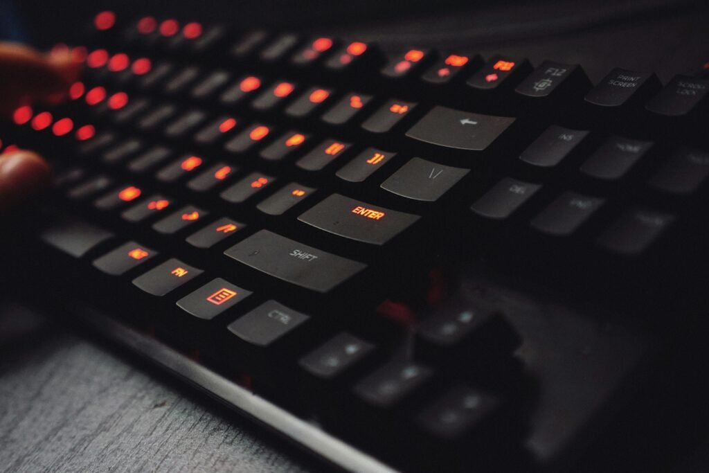 A close-up of a high-end mechanical keyboard in a dark aesthetic office for a professional content strategist.