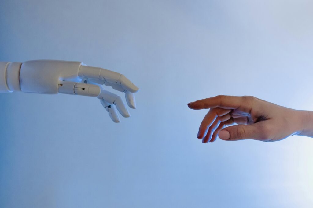A split-screen comparison showing a robotic hand typing generic code versus a human hand writing a personal story, illustrating the **AI vs. Human Content** debate in 2026.
