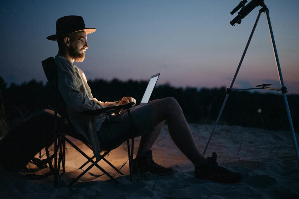A relaxing visualization of a workspace at the beach, representing the freedom of earning from passive income digital products on danijacob.com.