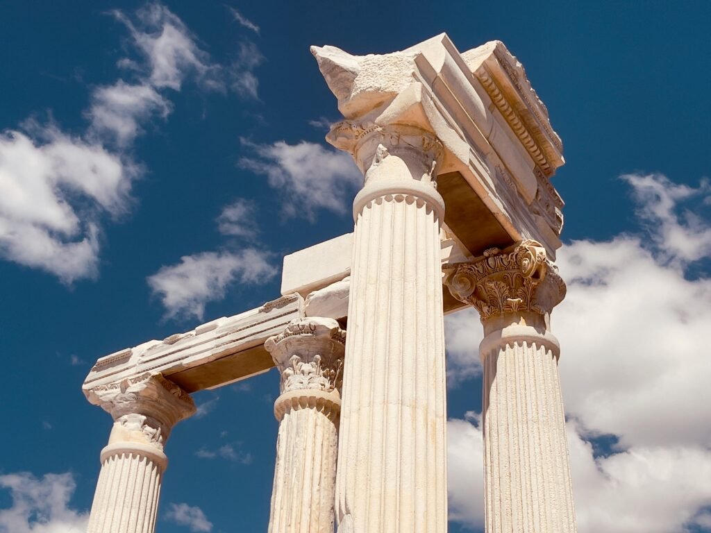 A symbolic image of a strong pillar vs a fragile glass, representing the difference between a robust and a high-maintenance digital asset.